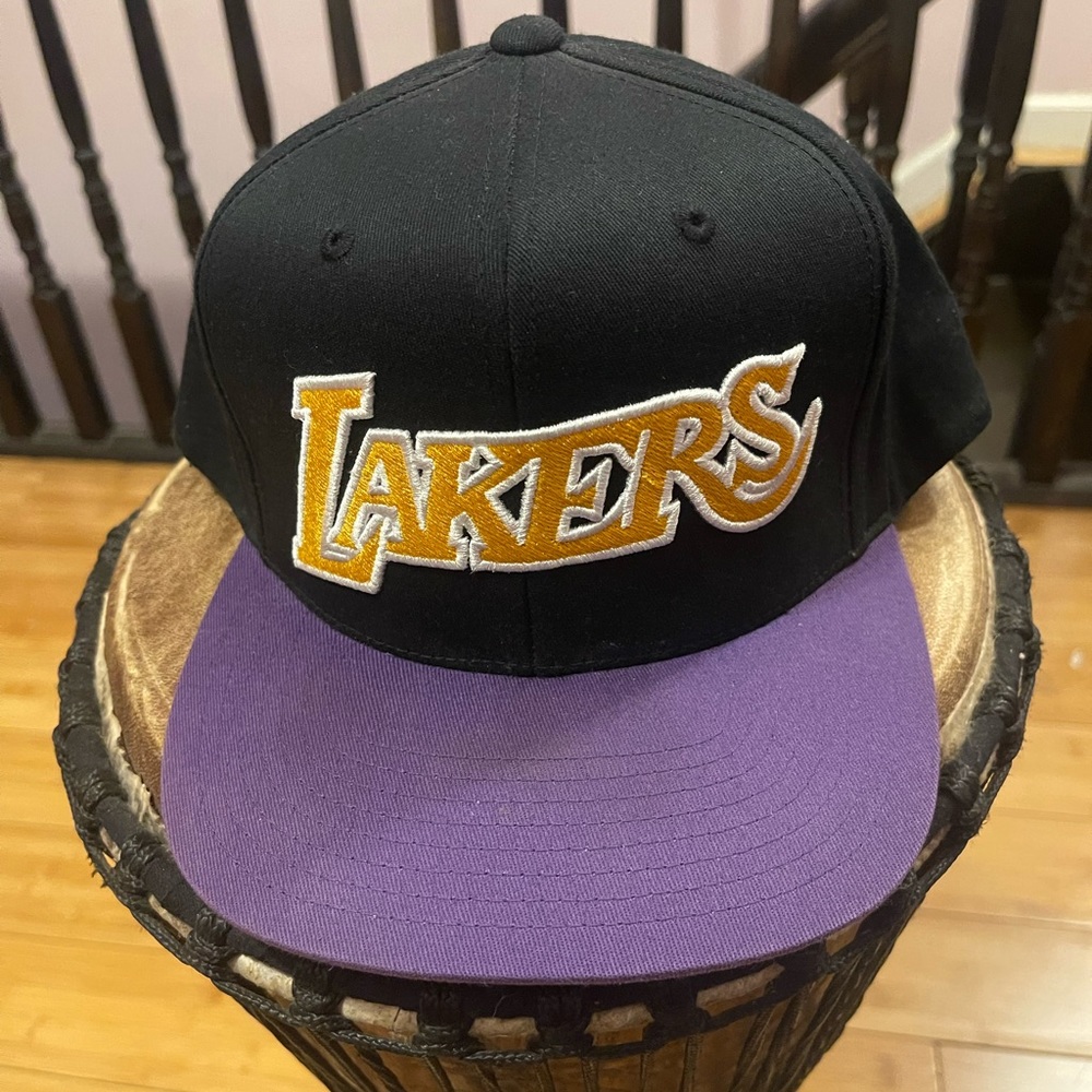 Black La Lakers Mitchell & Ness SnapBack. Good condition.
